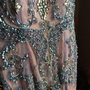 Never worn. Like new. Couture.